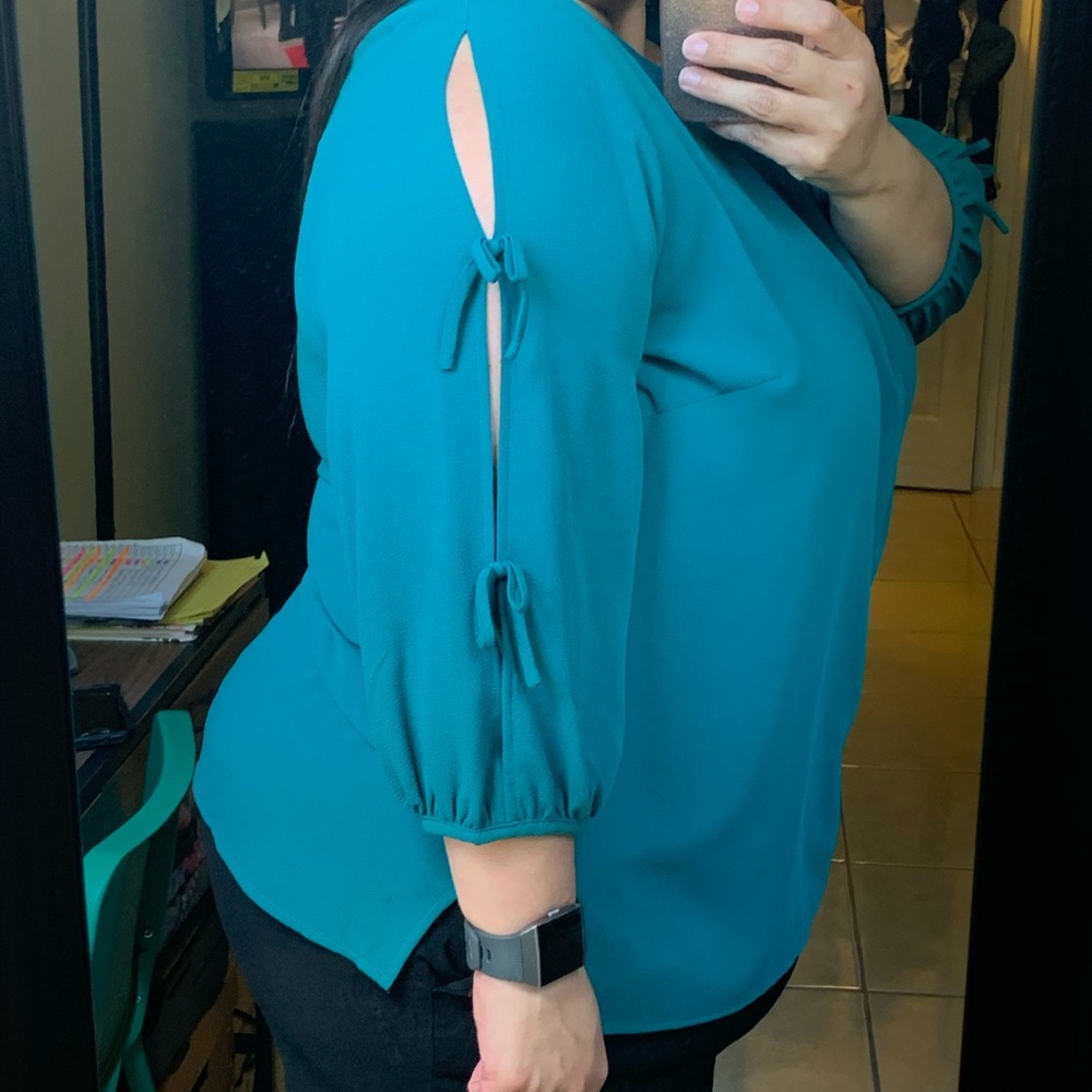 Green blouse with bows on sleeves!